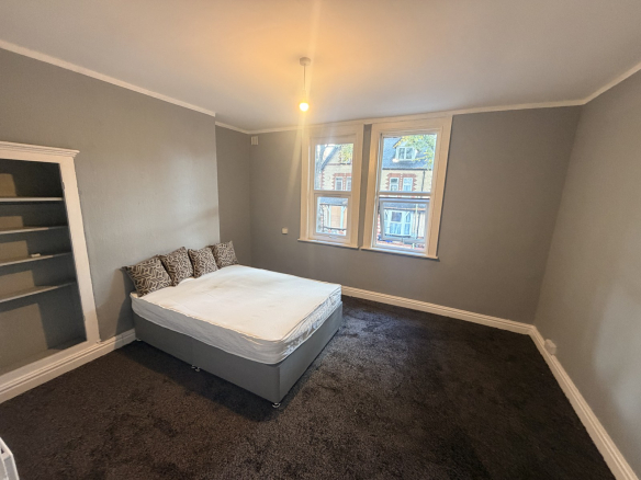 Double bedroom with fitted shelving, 22 Vaughan Avenue Flat 2